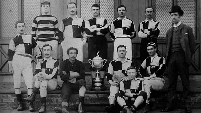 Darlington Football Club team photograph of 1887 with the Cleveland Challenge Cup; Arthur Wharton sits in the front row