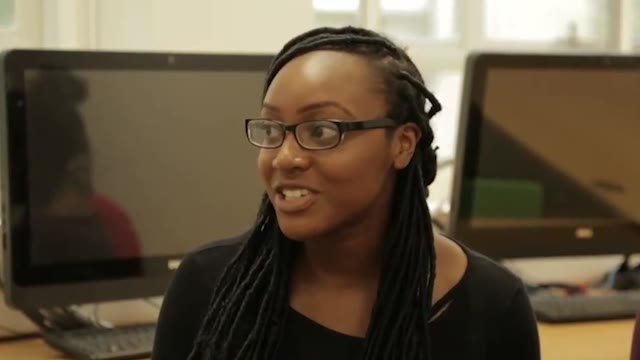 Charmaine Johnson, a student at Queen Mary University of London, interviewed in a computer room