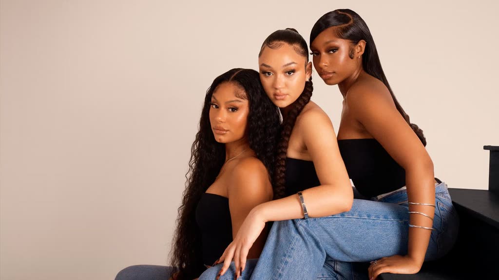 Jorja Douglas, Stella Quaresma and Renée Downer of the British R&B group FLO